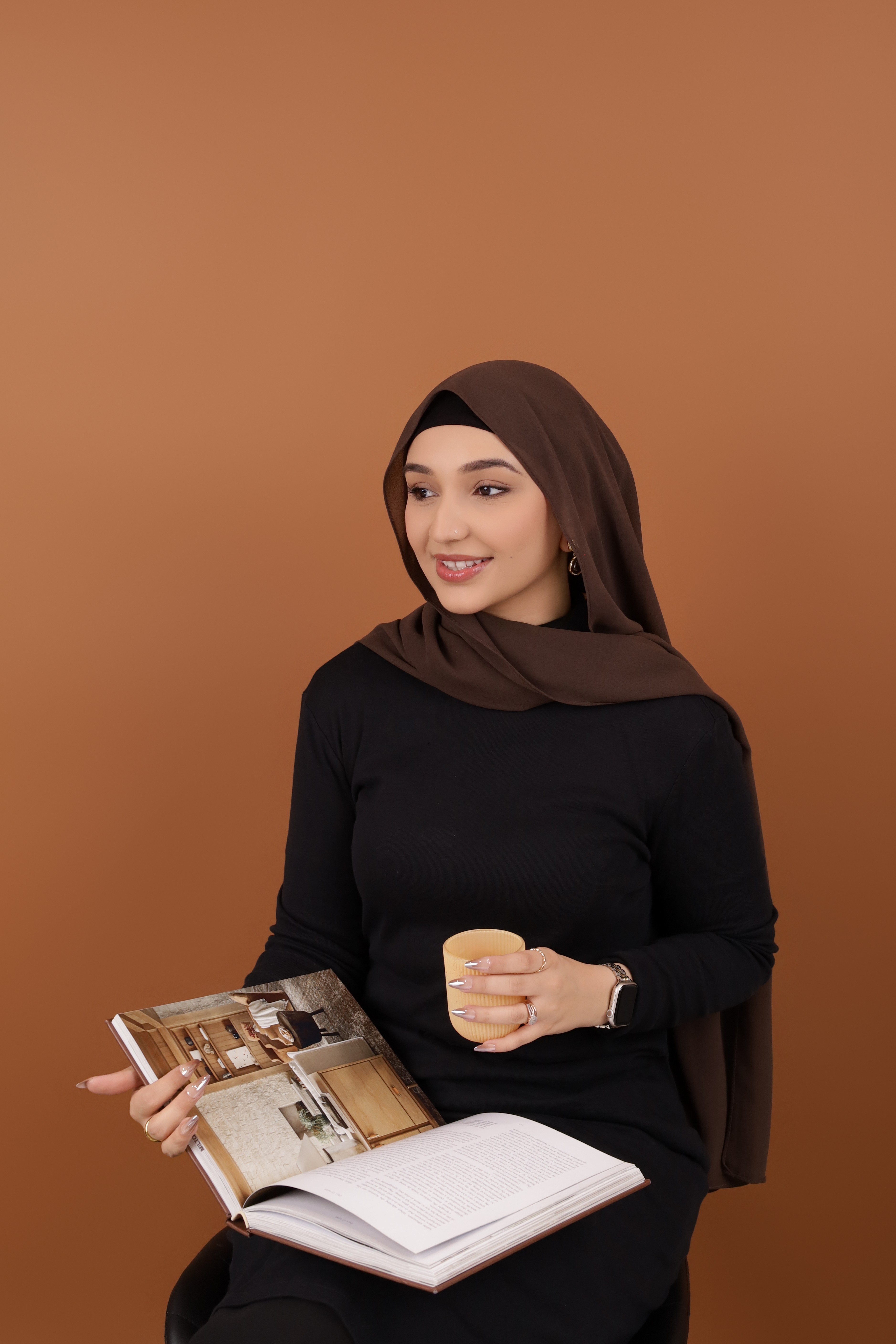 Designer portrait reading a design book